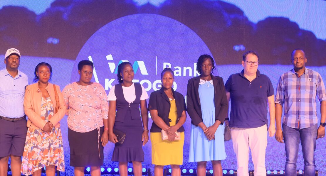 I&M Bank CEO Robin Bairstow (2R), Chief Financial Officer Timothy Musiime (R), and Katogo Golf Captain Elly Mukasa (L) share a joyful photo moment with some of the beneficiaries.